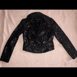 Shiny black and gold jacket